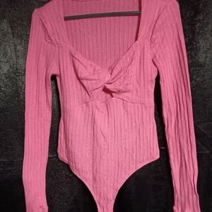 Pink body suit